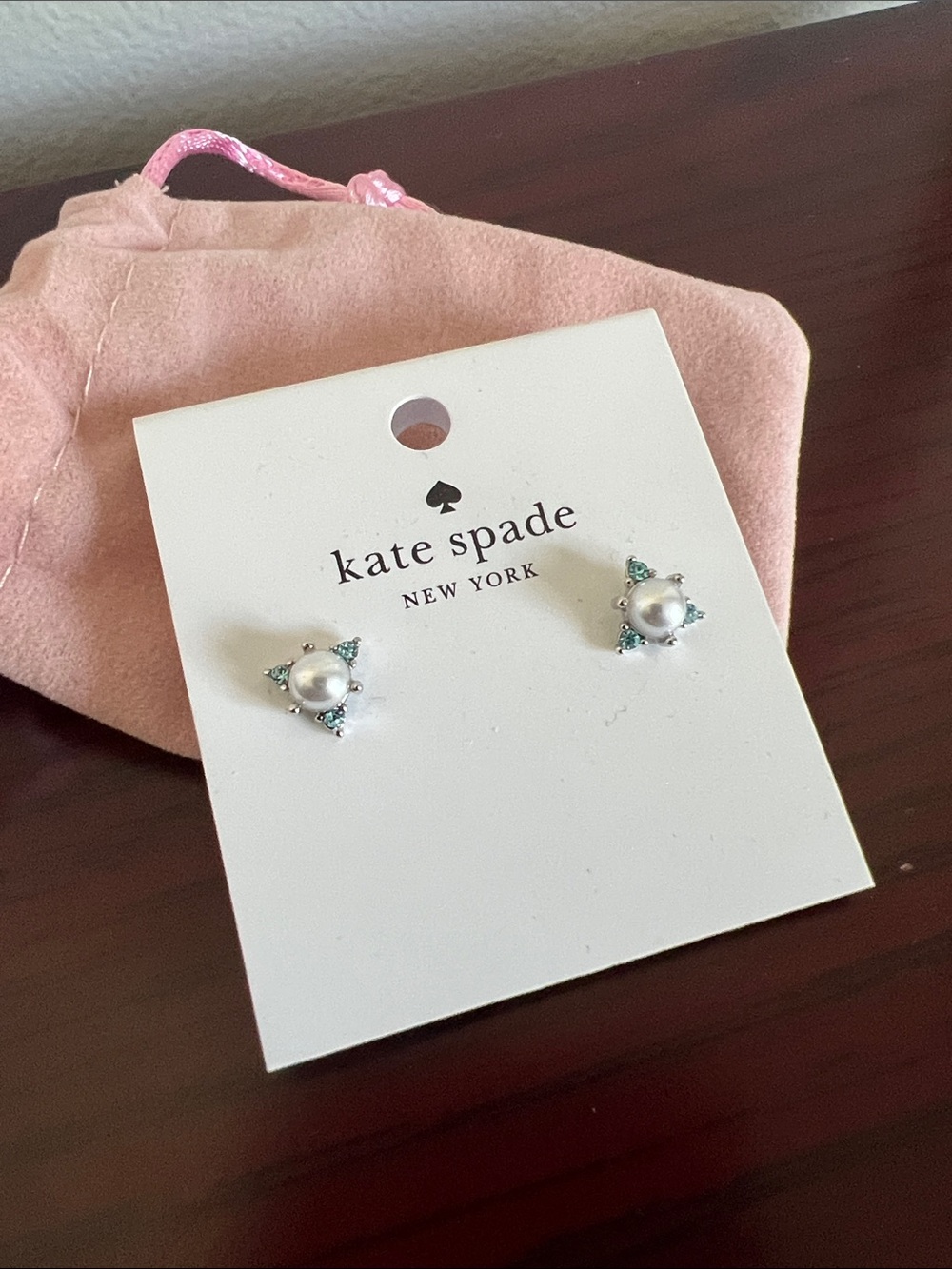 Kate Spade pearl earrings with blue crystal accents